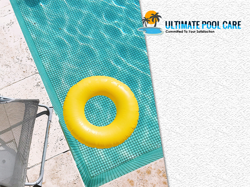 yellow-pool-tube-above-pool-safety-net